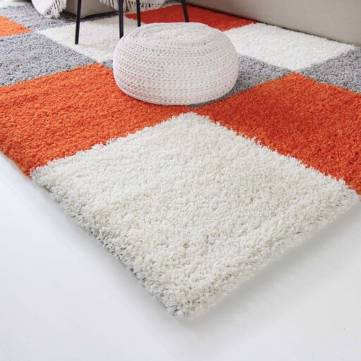 Hoogpolig vloerkleed shaggy Trend blokken - oranje - close up hoek