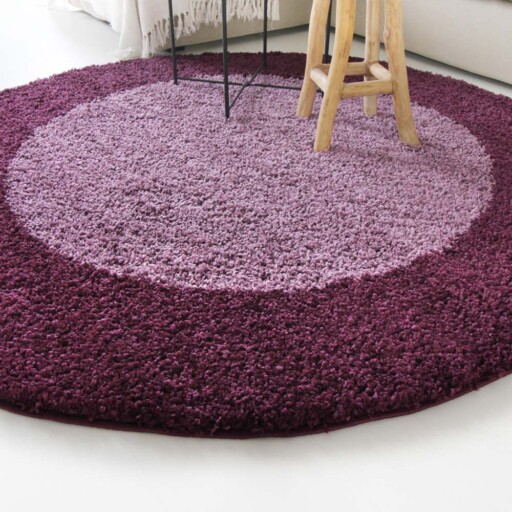 Hoogpolig vloerkleed shaggy Trend lijstmotief rond - paars - close up zijkant