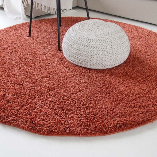 Hoogpolig vloerkleed shaggy Trend effen rond - terracotta - close up zijkant