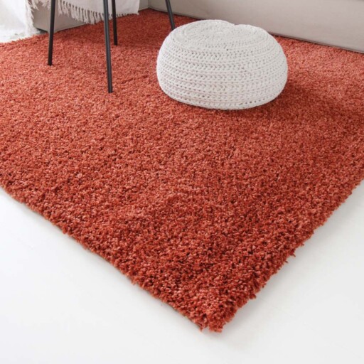 Hoogpolig vloerkleed shaggy Trend effen - terracotta - close up hoek, thumbnail