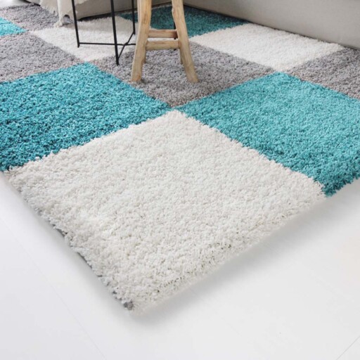 Hoogpolig vloerkleed shaggy Trend blokken - turquoise - close up hoek