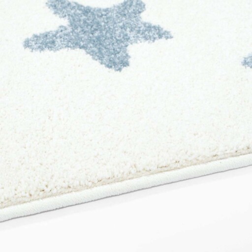 Vloerkleed kinderkamer Kleine Sterren 3D - crème/blauw - close up zijkant, thumbnail