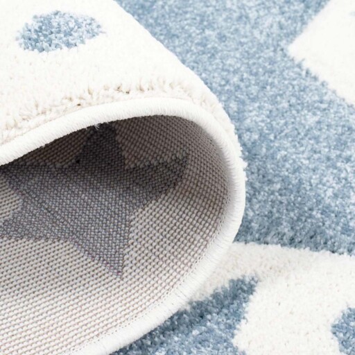 Rond vloerkleed kinderkamer Sterren 3D - crème/blauw - close up vouw, thumbnail