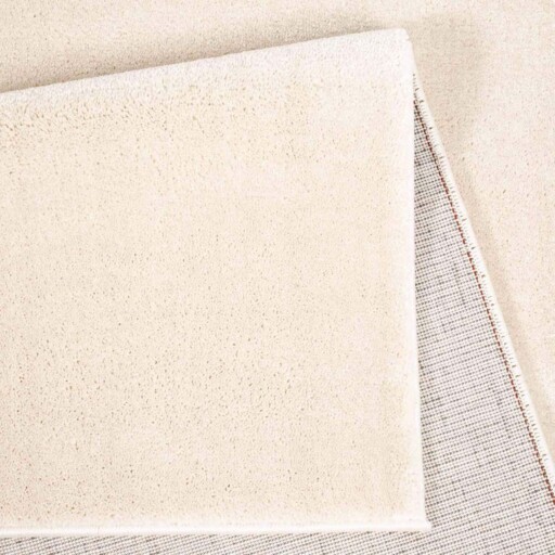 Effen vloerkleed velours Gala - ivoor - close up vouw, thumbnail