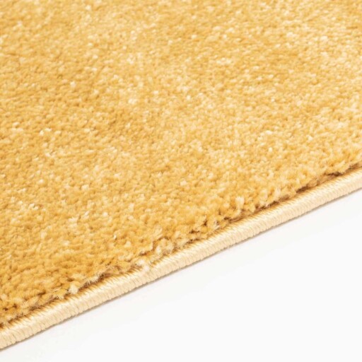 Effen vloerkleed velours Gala - geel - close up zijkant, thumbnail