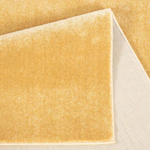 Effen vloerkleed velours Gala - geel - close up vouw, thumbnail