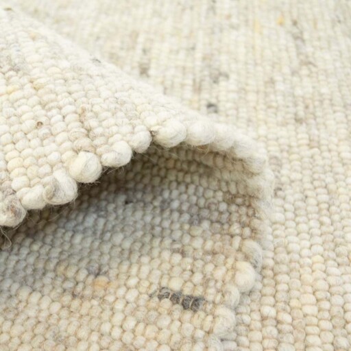 Wollen vloerkleed handweef Ylva - beige - close up vouw, thumbnail