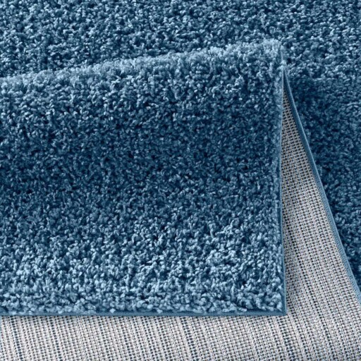 Hoogpolig vloerkleed effen Spectrum - blauw - close up vouw, thumbnail