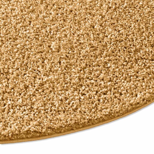 Rond vloerkleed hoogpolig effen Spectrum - mosterdgeel - close up zijkant, thumbnail