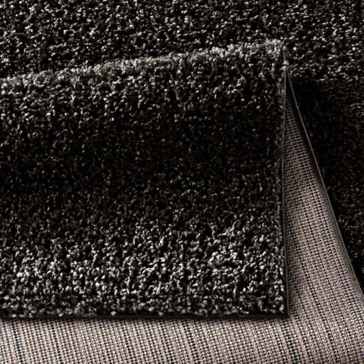 Hoogpolig vloerkleed effen Spectrum - zwart - close up vouw, thumbnail