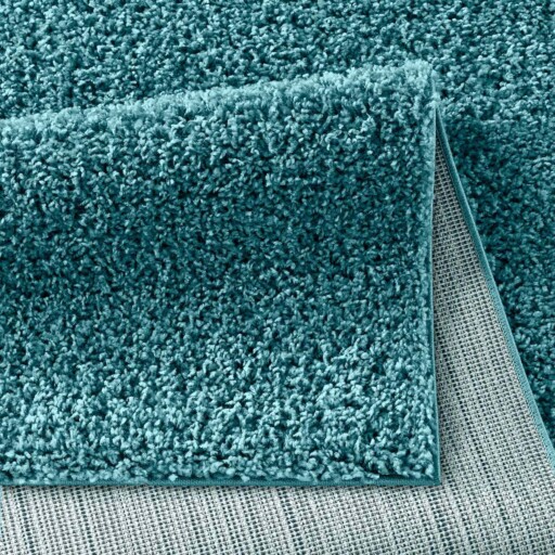 Hoogpolig vloerkleed effen Spectrum - turquoise - close up vouw, thumbnail