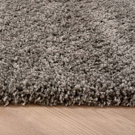 Hoogpolig vloerkleed shaggy Grand effen - lichtgrijs - close up zijkant, thumbnail