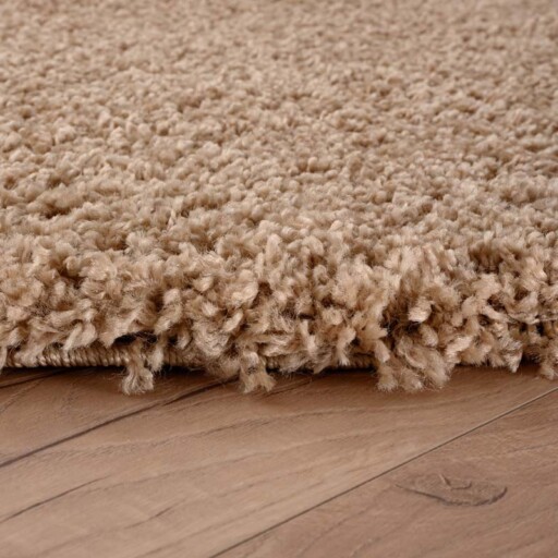 Rond hoogpolig vloerkleed shaggy Grand effen - beige - close up zijkant, thumbnail