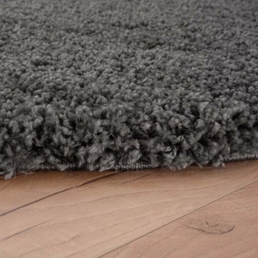 Rond hoogpolig vloerkleed shaggy Grand effen - donkergrijs - close up zijkant, thumbnail