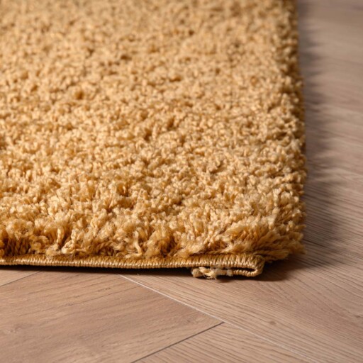 Hoogpolig vloerkleed shaggy Trend effen - goud - close up hoek, thumbnail