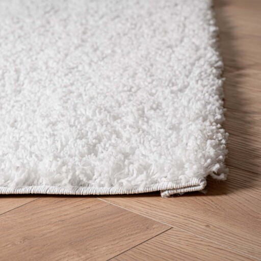 Hoogpolig vloerkleed shaggy Trend effen - wit - close up hoek, thumbnail