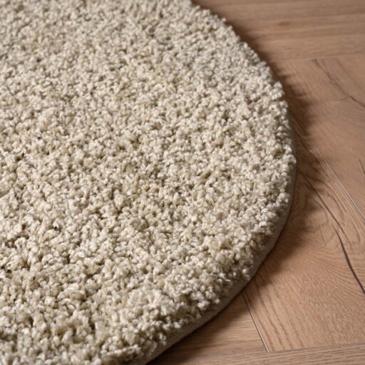 Rond hoogpolig vloerkleed shaggy Trend effen - champagne - close up zijkant, thumbnail