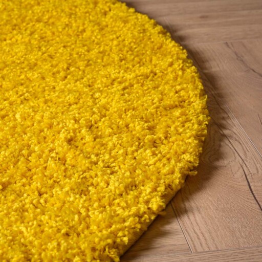 Rond hoogpolig vloerkleed shaggy Trend effen - geel - close up zijkant, thumbnail