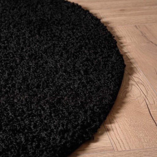 Rond hoogpolig vloerkleed shaggy Trend effen - zwart - close up zijkant, thumbnail