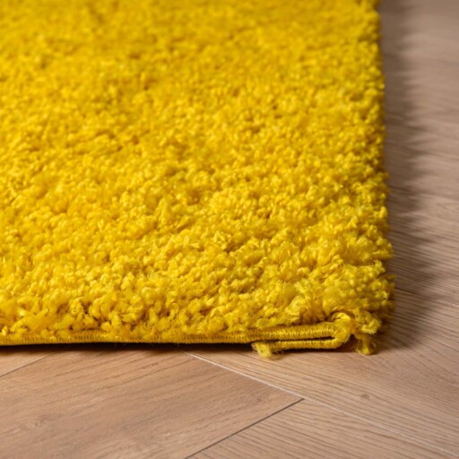 Vierkant hoogpolig vloerkleed shaggy Trend effen - geel - close up hoek
