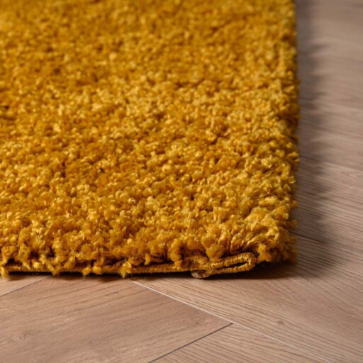 Vierkant hoogpolig vloerkleed shaggy Trend effen - okergeel - close up hoek