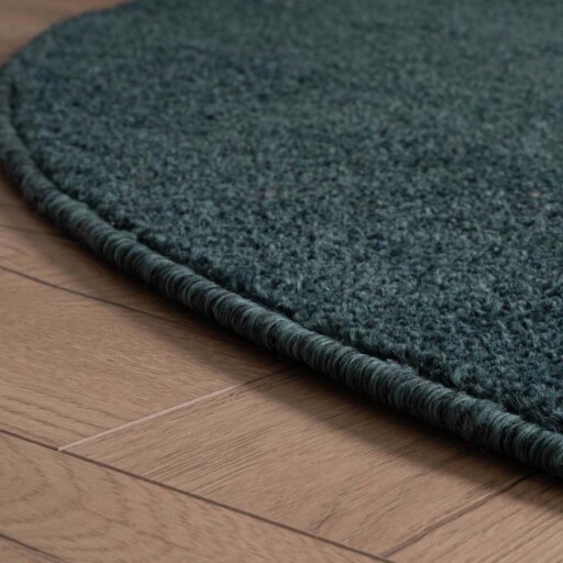 Rond vloerkleed Fine - petrol - close up zijkant, thumbnail