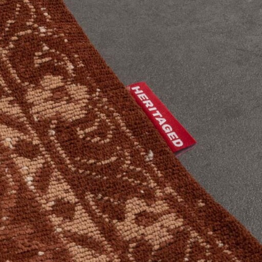 Vintage vloerkleed Nomad - roestbruin - close up zijkant, thumbnail