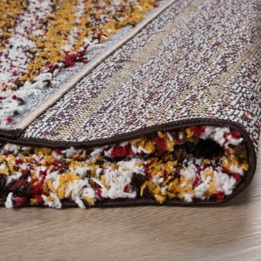 Hoogpolig vloerkleed strepen Artisan - multi/okergeel - close up vouw, thumbnail