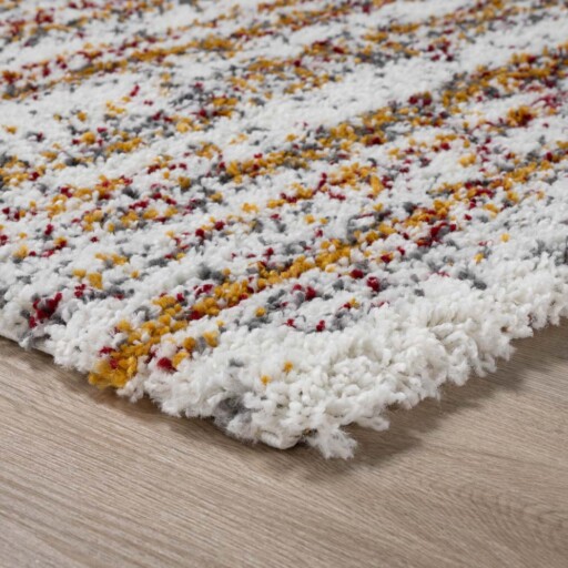 Hoogpolig vloerkleed strepen Artisan - wit/multi - close up hoek, thumbnail