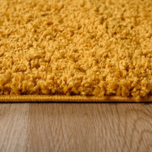 Ovaal hoogpolig vloerkleed shaggy Trend effen - okergeel - close up, thumbnail