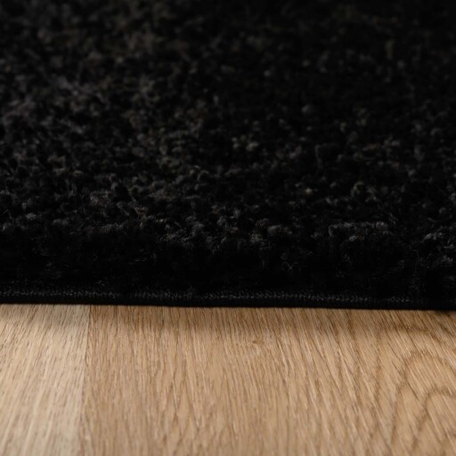 Ovaal hoogpolig vloerkleed shaggy Trend effen - zwart - close up, thumbnail