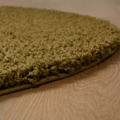 Rond hoogpolig vloerkleed shaggy Trend effen - olijfgroen - close up, thumbnail