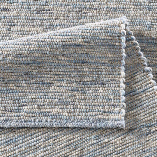 Wollen vloerkleed - Kaia lichtblauw - close up vouw, thumbnail