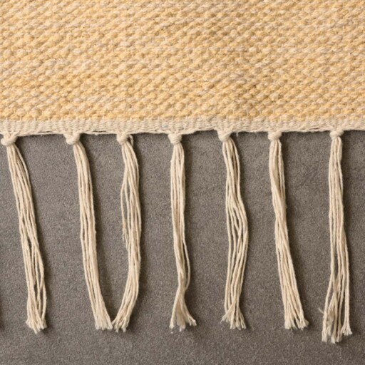 Bohemian vloerkleed - Cueva geel/beige - close up zijkant, thumbnail