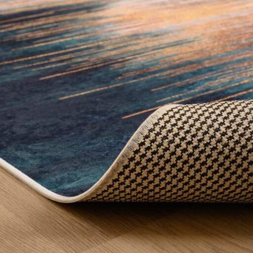 Modern vloerkleed wasbaar - Moderna goud/petrol - close up vouw, thumbnail