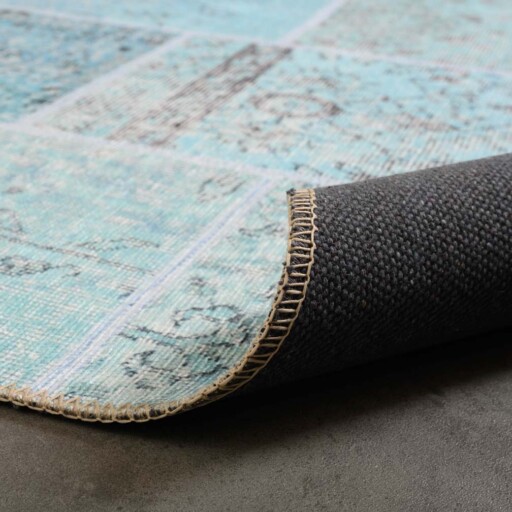 Patchwork vloerkleed - Fade Heritage turquoise - close up vouw, thumbnail